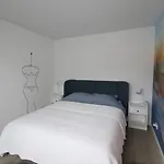 Strandhuisje Achter De Duinen. *