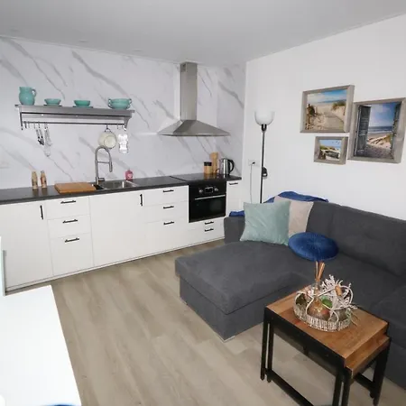 아파트 Strandhuisje Achter De Duinen.